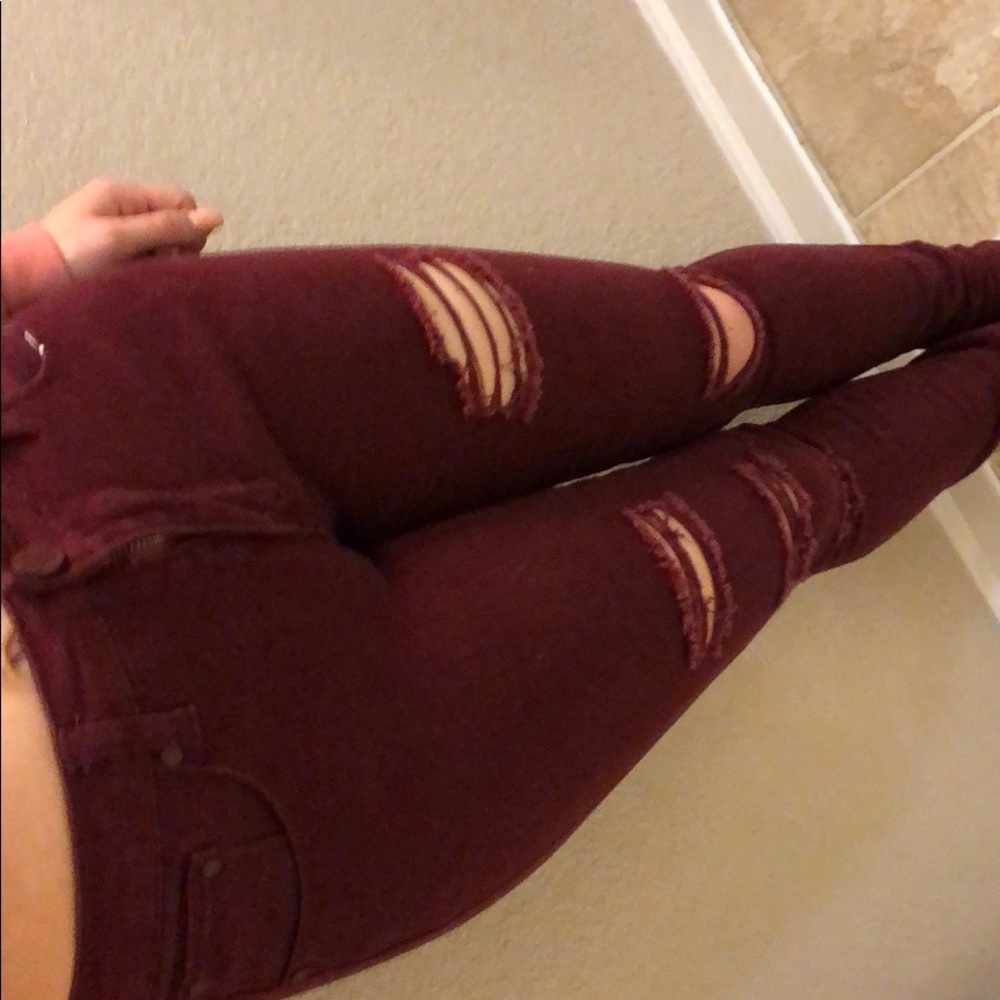 Maroon ripped skinny jeans